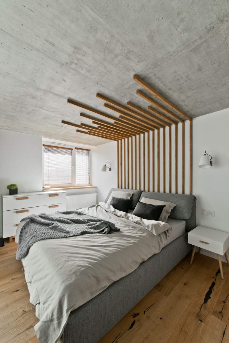 skandinavischer stil in grau beton optik schlafzimmer nachttisch weiss