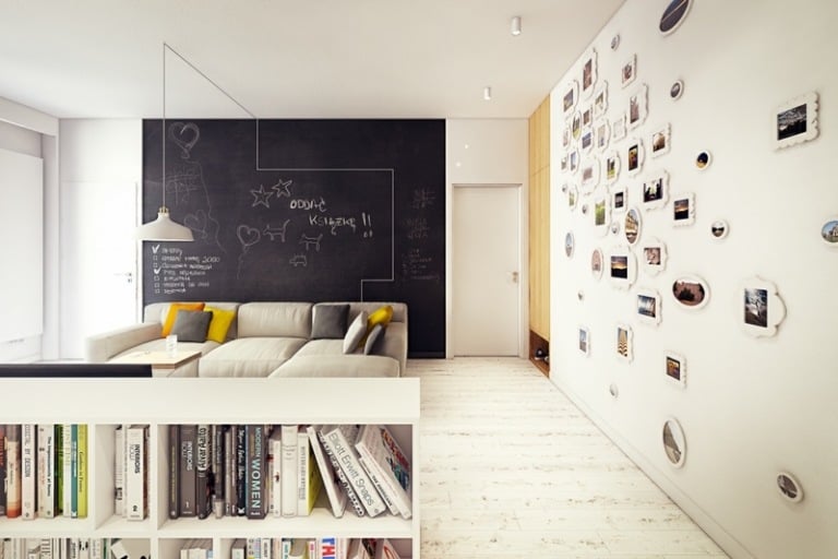 wandfarbe schwarze wohnzimmer gestaltung modern akzentwand raumteiler regal fotos wanddeko