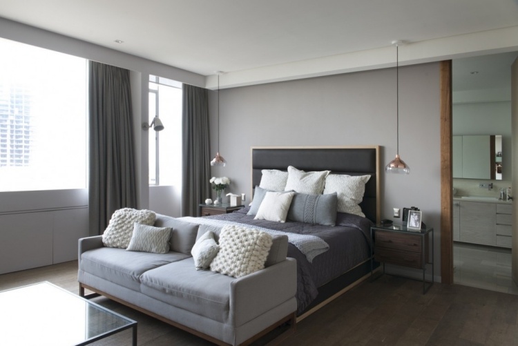 schlafzimmer-grau-modern-wandfarbe-couch-bett-holz