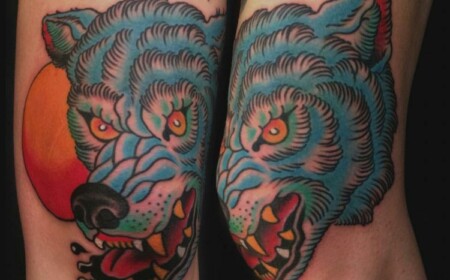 tattoo wolf farbig blau zaehne grimmig mond orange
