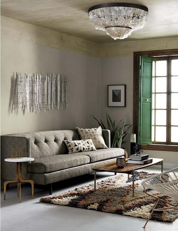 designermobel-dekoration-interior-design--wohnzimmer-teppichcouch-beige-kronleuchter-neutrale-farben