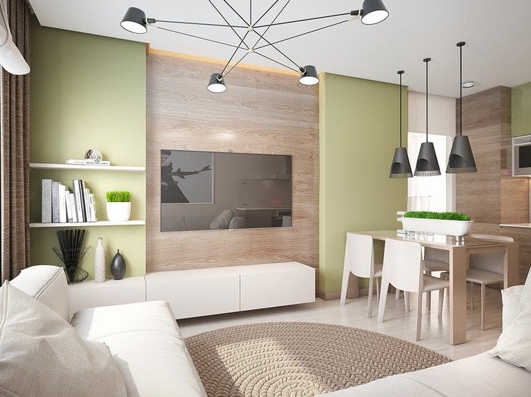 Wohntrends 2016 wohnzimmer-holzwand-hellgruene-wandfarbe-weisse-moebel-schwarze-lampen