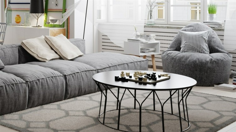 gestalten-wohnung-couchtisch-metall-rund-modern-couch-sofakissen