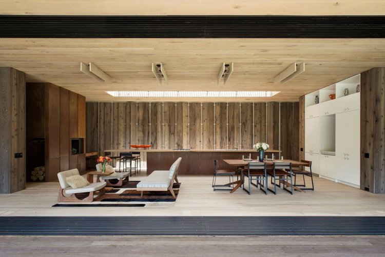 Holzverkleidung innen -aussen-minimalistisch-wohnzimmer-terrassentüren-schieben-offen-modern