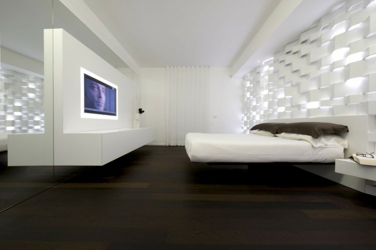 indirekte-beleuchtung-schlafzimmer-wand-relief-weiss-bett-holzboden