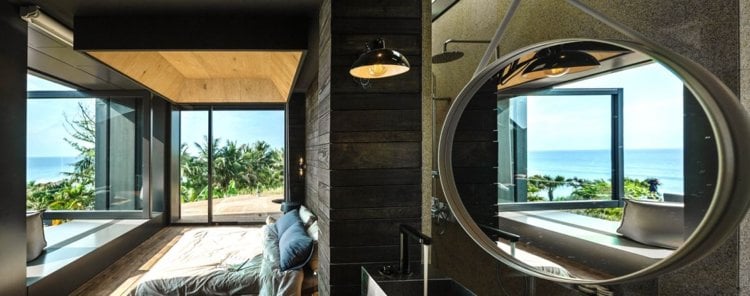 natursteine-findlinge-modern-schlafzimmer-dunkel-terrassentueren-panoramafenster