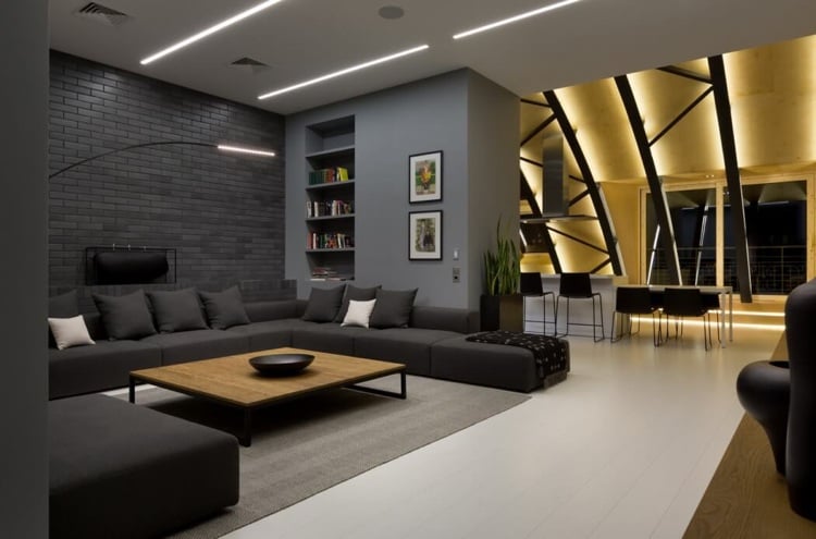 Anthrazit Farbe -modern-dachgeschosswohnung-wohnzimmer-pffen-kueche-couch-ziegel