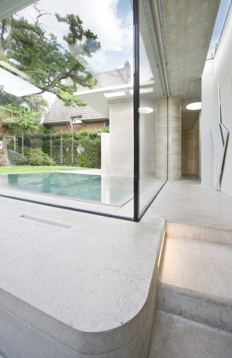 abgerundete-wände-anbau-idee-beton-pool-ausblick