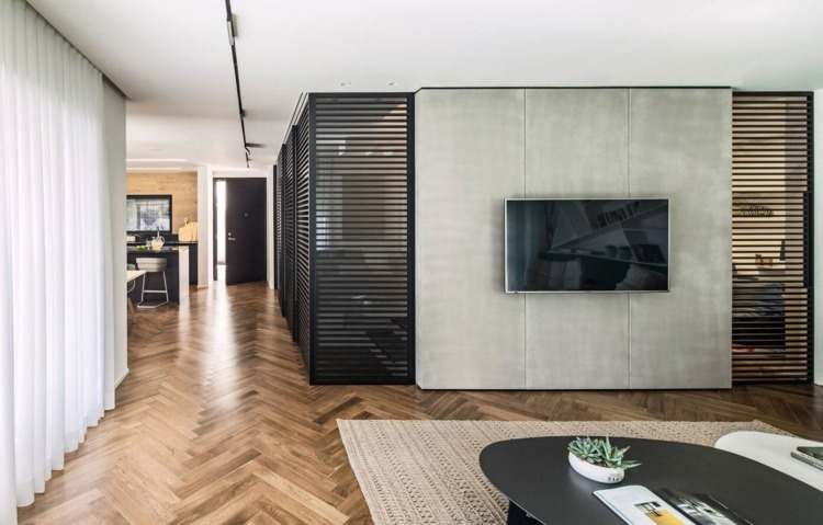 aluminium raumteiler in schwarz wohnzimmer-akzentwand-beton