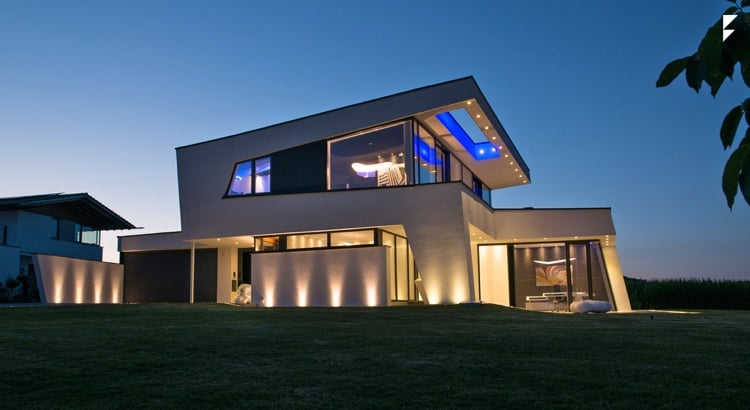 Dachformen in moderner Architektur pultdach-geneigt-einfamilienhaus-nachtbeleuchtung