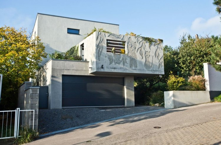 fassaden gestaltung beton-garage-einfahrt-modern