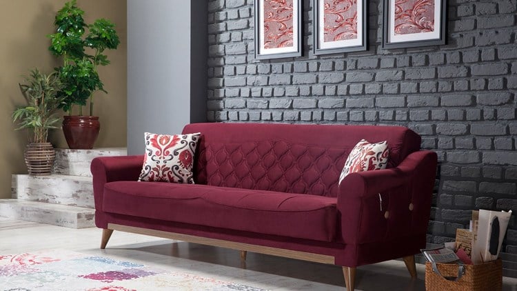 rote-couch-wandgestaltung-grau-verblendsteine-ziegel