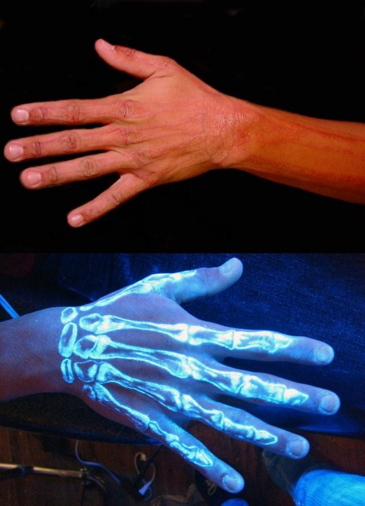 schwarzlicht-tattoo-farbe-hand-arm-skelett-floureszent