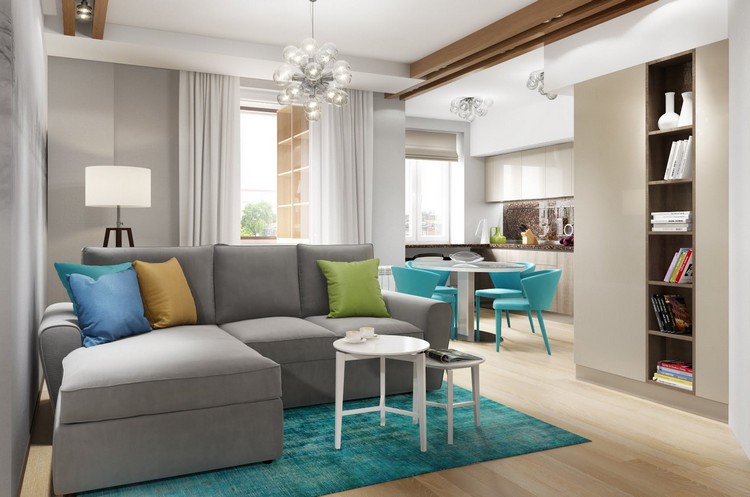 wohnzimmer-türkis-akzente-teppich-stühle-graues-sofa-beleuchtung-holzleisten-decke-eingebautes-bücherregal