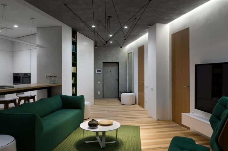 farbe-grün-wohnzimmer-grau-akzentwand-modern-lampe