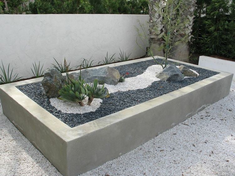 pflanzkübel aus beton rechteckig-grau-zierkies-gestaltung-garten