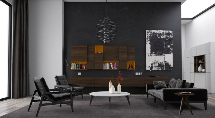 wohnzimmer-ideen-schwarzes-sofa-akzentwand-lowboard-stuehle