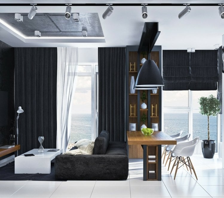 wohnzimmer-ideen-schwarzes-sofa-esstisch-eames-weiss-pendelleuchten