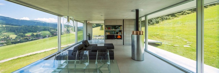 beton-design-innen-betonhaus-wohnzimmer-panoramafenster-heizofen