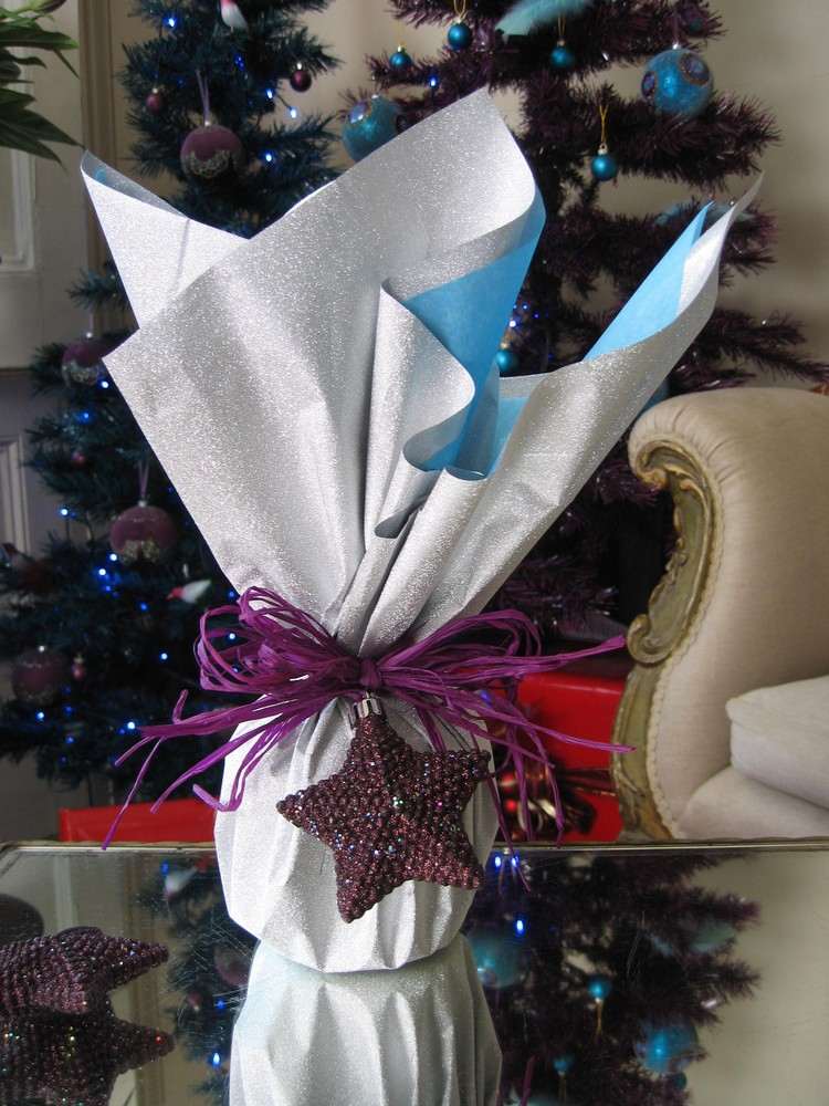 runde-geschenke-verpacken-weihnachten-weihnachtsschmuck-stern-glitzernd