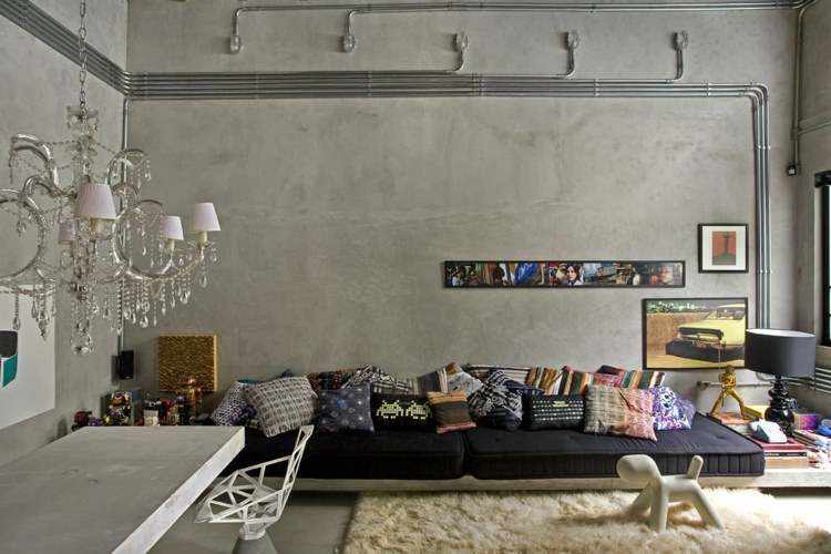 wandgestaltung-betonoptik-art-deco-kronleuchter-edel-couch-schwarz