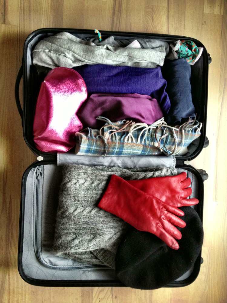 koffer-packen-checkliste-tipps-reisegepäck-sortieren-handgepäck