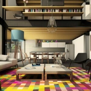 wohnzimmer-renovieren-teppich-bunt-geometrisch-figuren-stehelampe-hängelampe-sessel-tisch-sofa-bücherregal