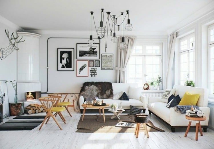 zimmer aufräumen tipps modern-wohnzimmer-sofas-pendelleuchten-stühle-beistelltisch-bilder-kamin