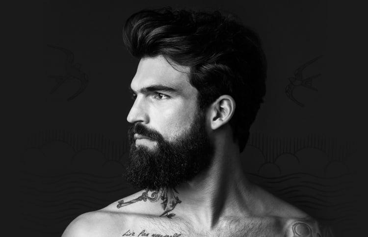 hipster bart vollbart-mann-brünett-haar-lang-oberlippenbart-tattoos