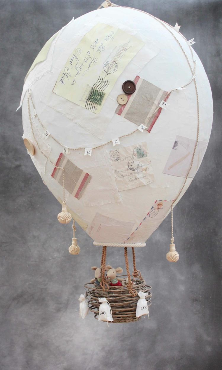 dekoration-korb-knöpfe-briefe-heißluftballon