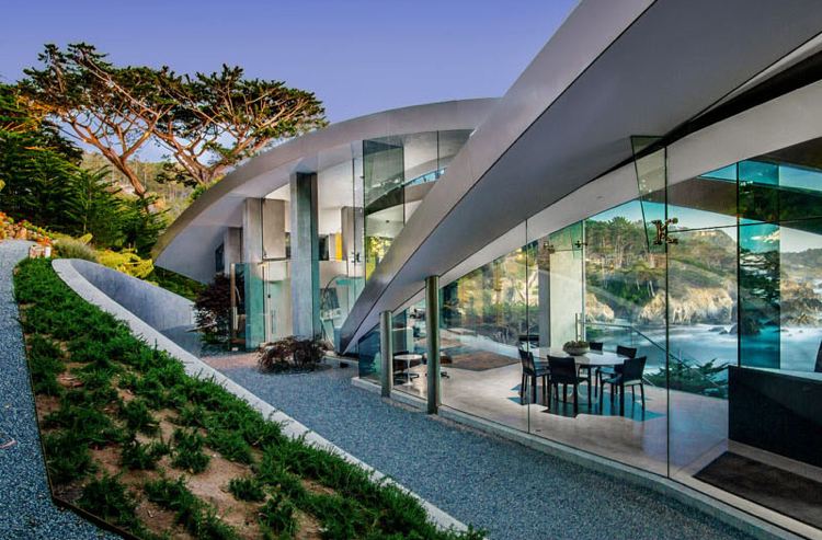 Fassade aus Glas -beton-garten-kies-architektur