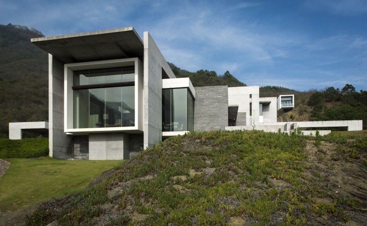Bauhaus-Stil Haus -granit-beton-natur-landschaft