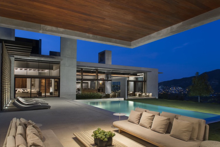 bauhaus-stil-haus-granit-beton-terrasse-outdoor-lounge-pool