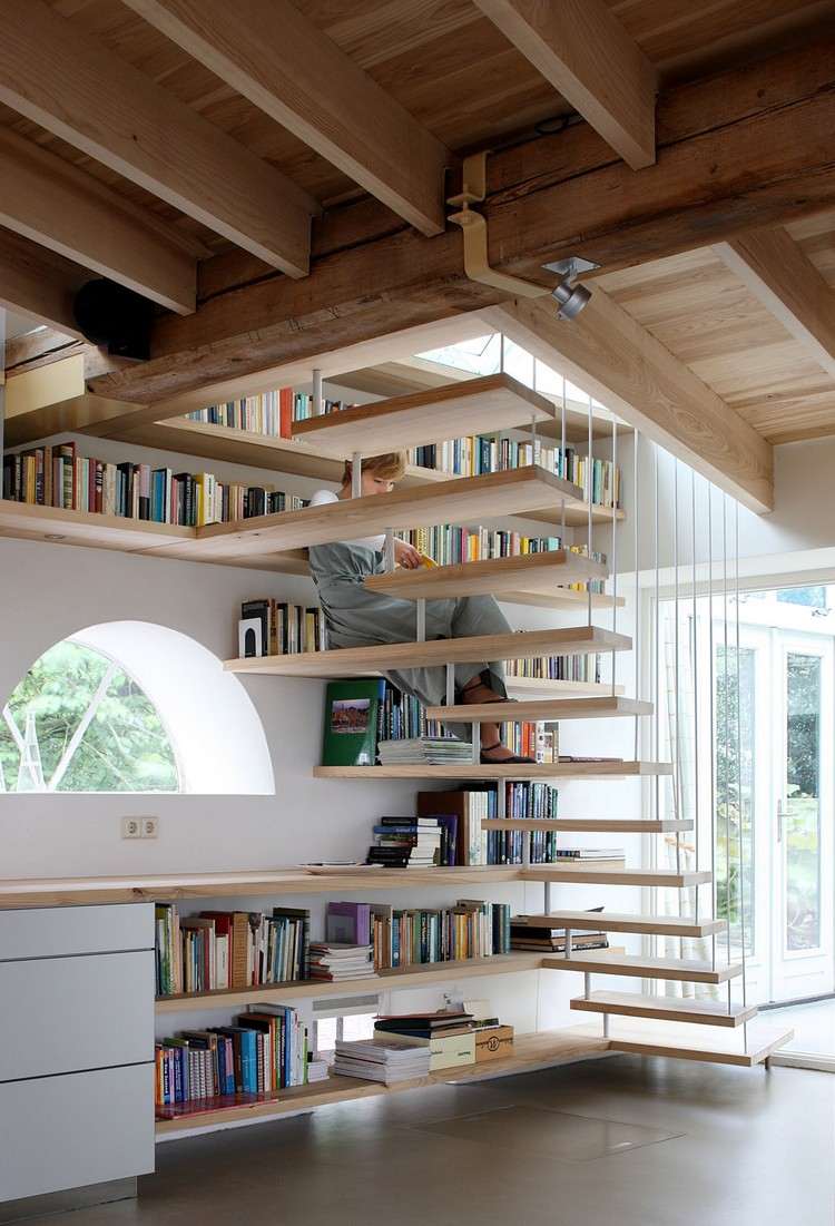 einrichtungsideen hausbibliothek wandregale schwebende treppe