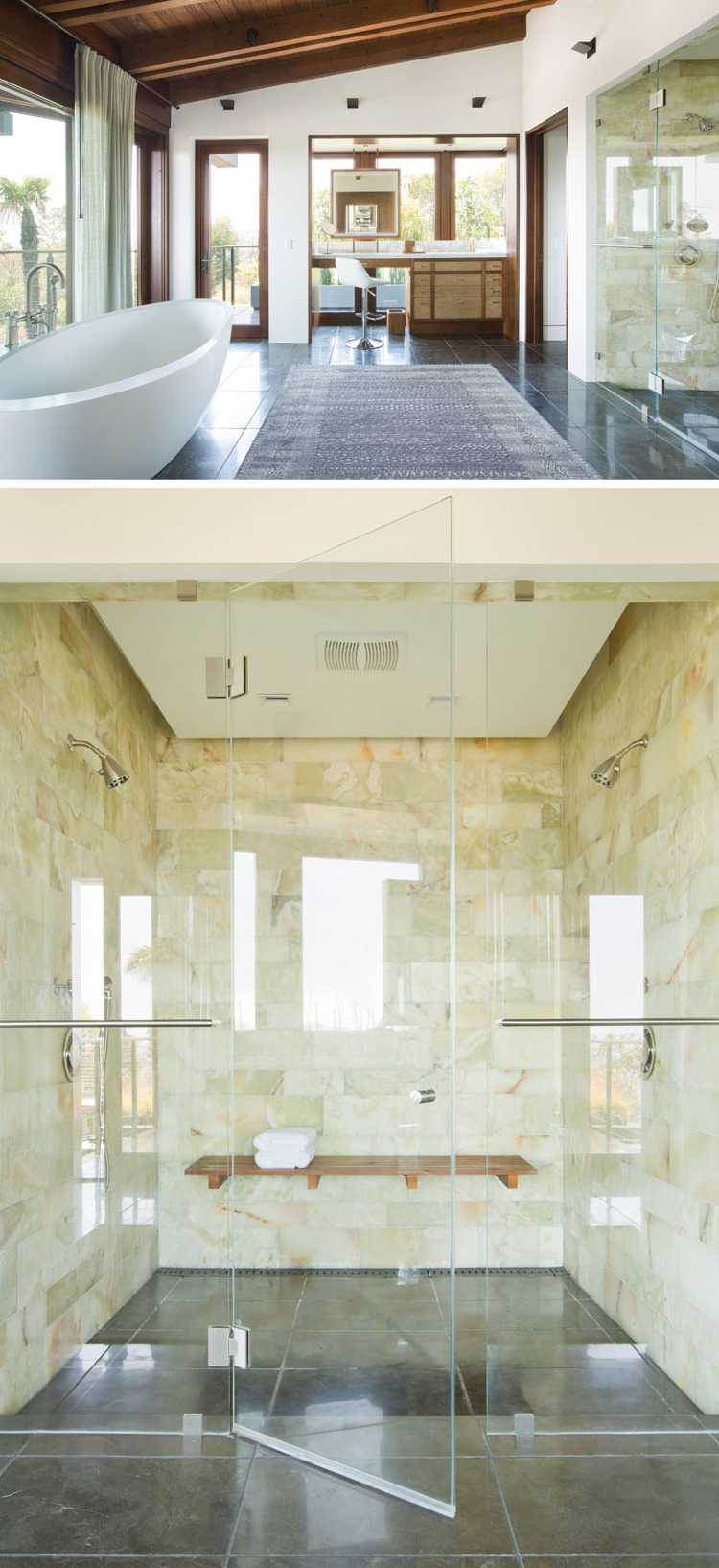 natursteinverkleidung innen badezimmer glaswand freistehende badewanne fenster