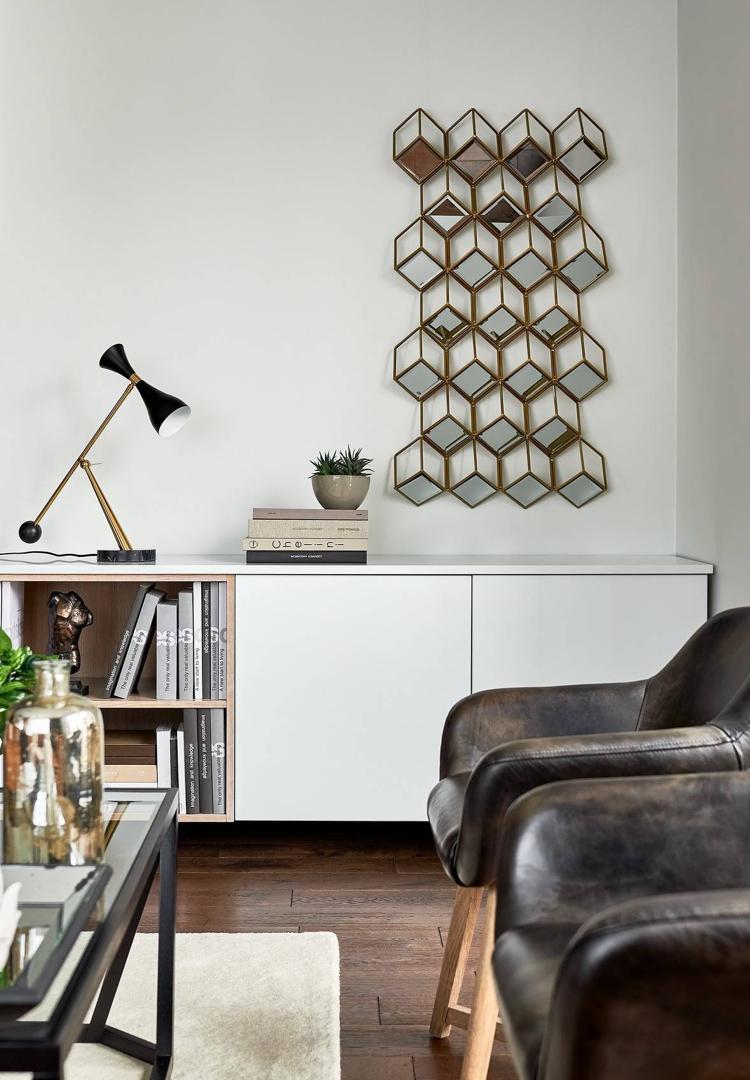 warme farbtöne lederpolster sessel modernes wohnzimmer sideboard weiss