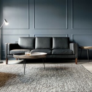 dunkle farben texturen wohnbereich couch couchtisch teppich
