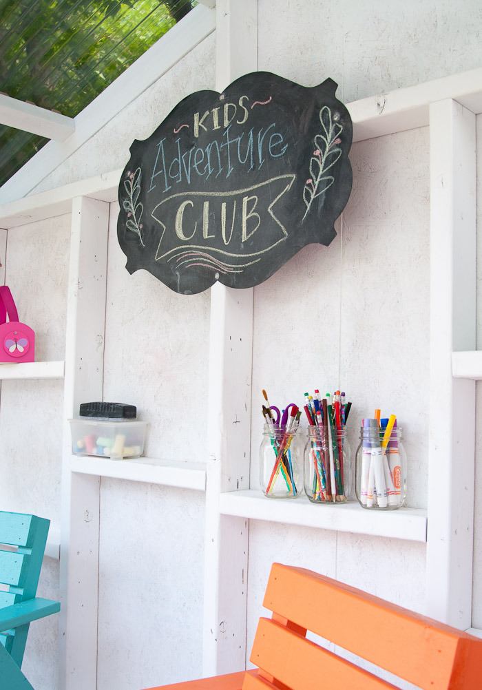 Spielhaus Garten Holz mit Rutsche selber bauen Kinder malen spielen