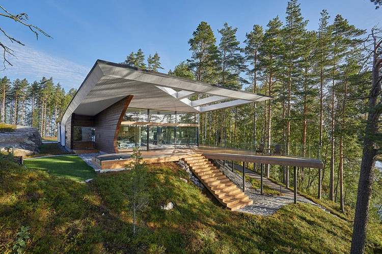 modernes blockhaus außergewöhnliche form herausragende terrasse