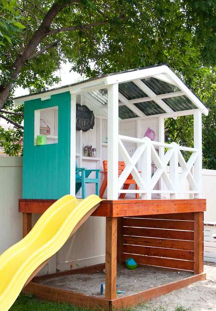 stelzenhaus kinderspielhaus holz selber bauen mit Rutsche und Sandkasten