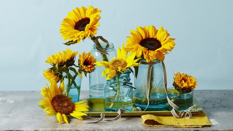 einfache ideen sommerdeko sonnenblumen verschiedene glasvasen