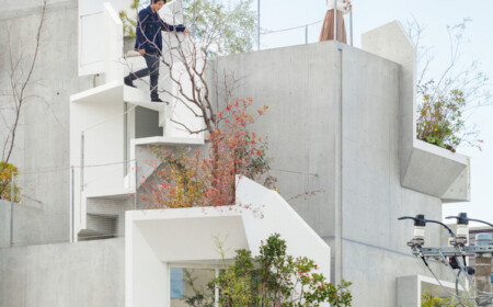 Grün in der Stadt Baumhaus aus Beton Pflanzen Bäume auf Balkonen