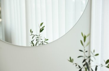 Wandspiegel mit Infrarot-Heizung rund elegant