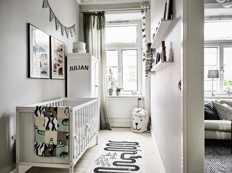 kleines babyzimmer grau weiß monochrom modern
