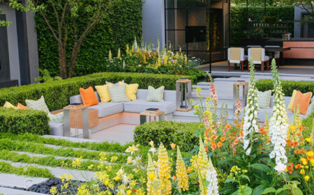 versunkener Sitzbereich Garten Gelb Orange Grau Weiß Farben modern