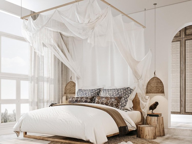 Schlafzimmer im Ethno Look Bett mit schieren Gardinen Korbleuchten