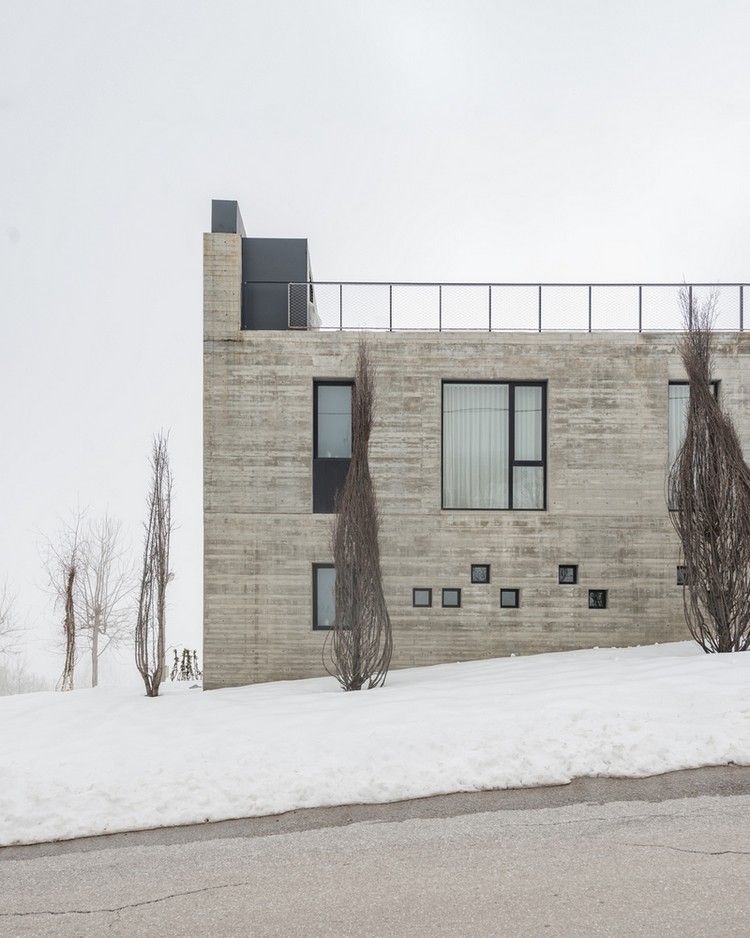 ferienhaus design fassade beton fenster verschiedene größen