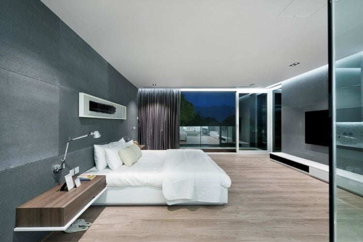 fernseher im schlafzimmer tv an die wand hängen design gestaltungsmöglichkeiten modern minimalistisch