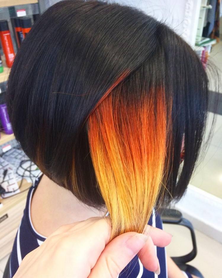 hidden hair color trend schwarze haare orange underlights