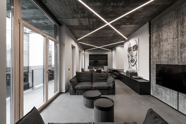 altbauwohnung renovieren ideen minimalistisch design betonwände beleuchtung grau kunststück bild sofa glastüren fernseher
